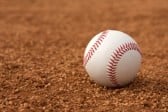 23748583-baseball-on-the-infield-dirt-with-room-for-copy